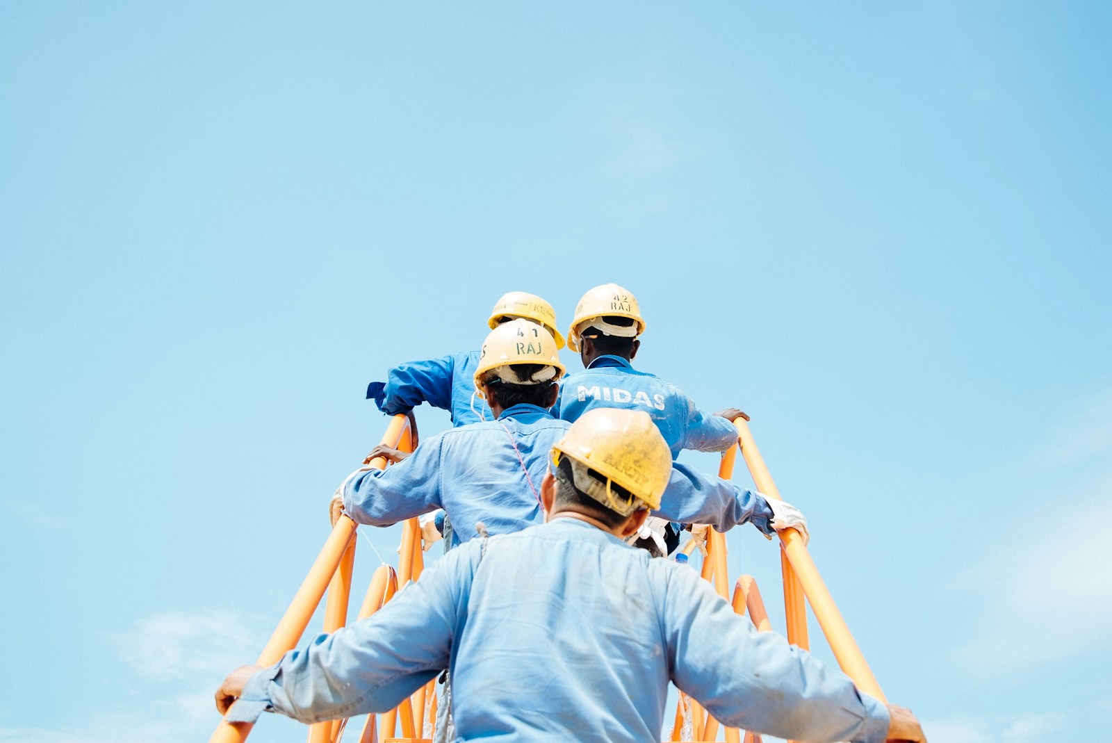 group of person on stairs with Workers’ Compensation Insurance